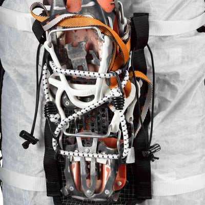 Detail shot of gear strapped in the Hyperlite Mountain Gear Ice Pack 70 Pack