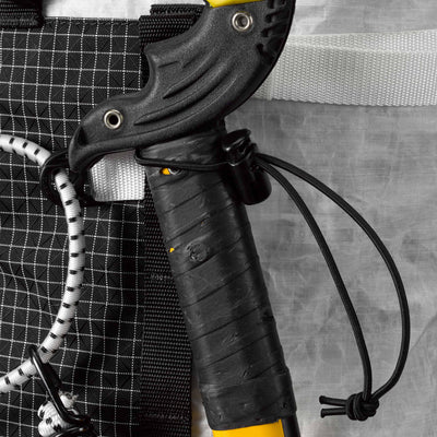 Detail shot of the bungees on Hyperlite Mountain Gear's Ice Pack 70 Pack in White
