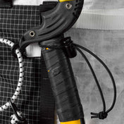 Detail shot of the bungees on Hyperlite Mountain Gear's Ice Pack 70 Pack in White