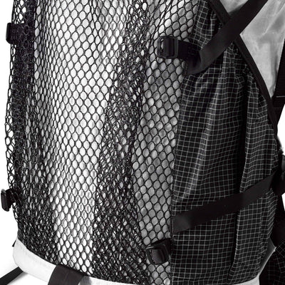 Detail shot of the exterior mesh of Hyperlite Mountain Gear's Junction 55 Pack in White